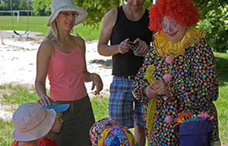 Balloon-twister having fun with kids